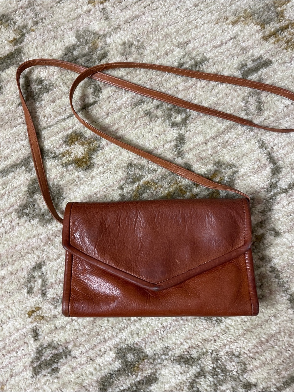 Vintage rain guarded soft leather cross body bag